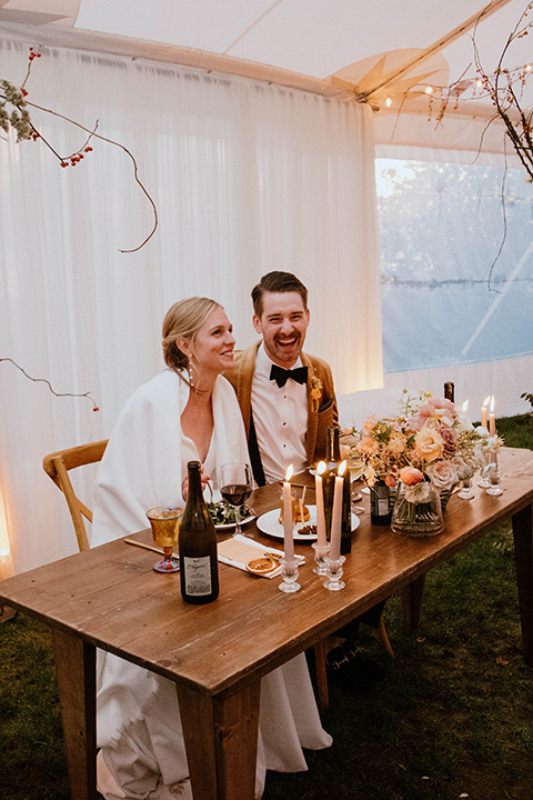  lizzie and tommys wedding on the beach with neutral colors and a gold velvet jacket – bride 