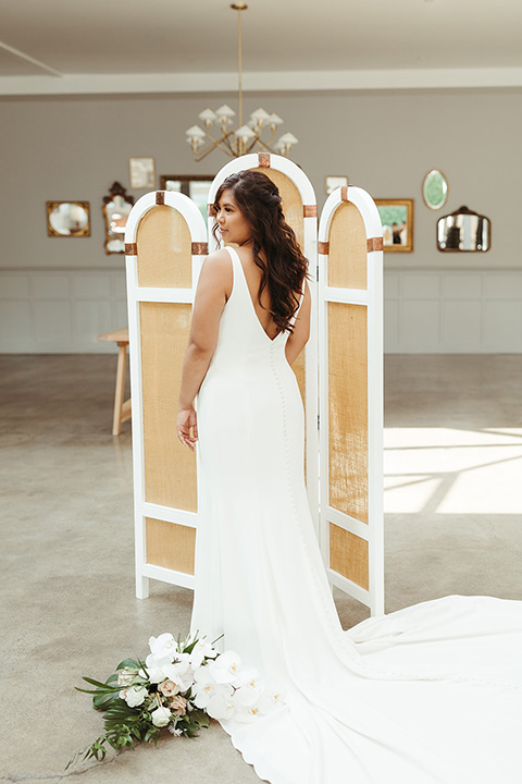  fun and tropical wedding inspired by Bali – the bride in her trendy formfitting gown  