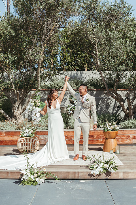  fun and tropical wedding inspired by Bali – bride and groom at the ceremony  