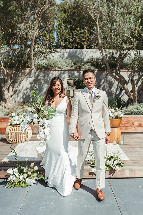  fun and tropical wedding inspired by Bali – bride and groom at the ceremony  
