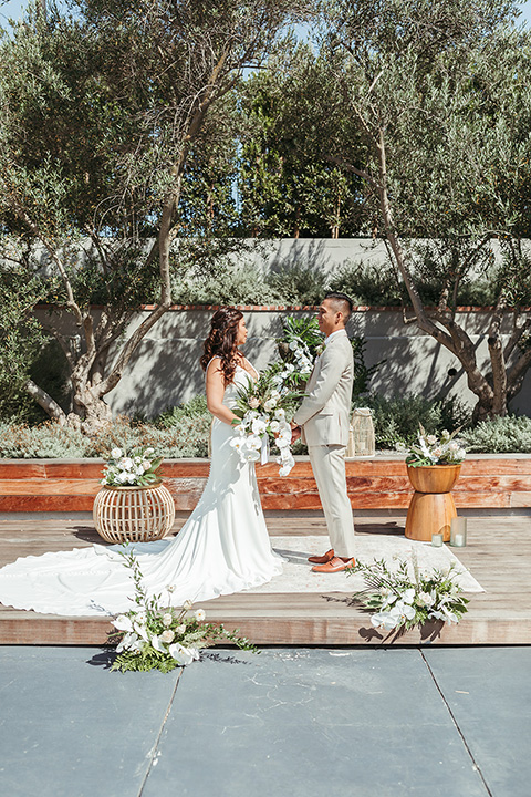  fun and tropical wedding inspired by Bali – bride and groom first kiss  