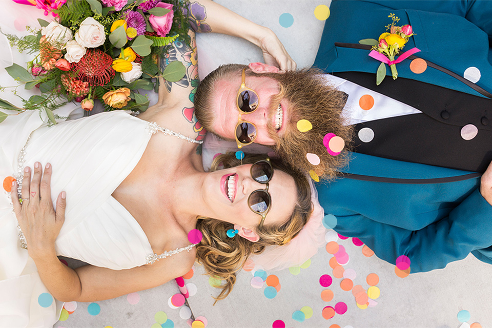  how to rent a suit or tuxedo in vegas a couple laying on the sidewalk in opposite directions photographed close up with their heads together