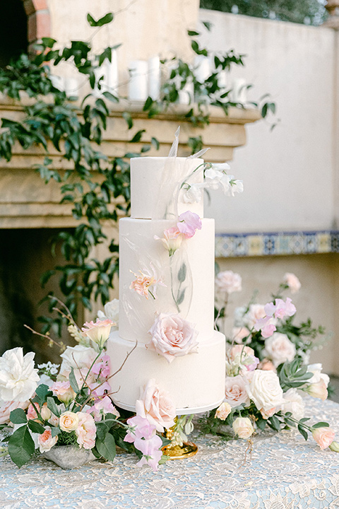  Garden Romance wedding with lush florals and the groom in  multiple looks 