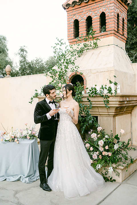  Garden Romance wedding with lush florals and the groom in  multiple looks 