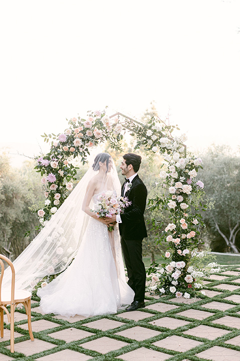  Garden Romance wedding with lush florals and the groom in  multiple looks 