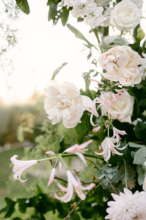  Garden Romance wedding with lush florals and the groom in  multiple looks 
