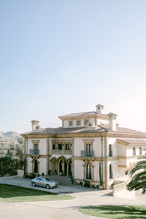  Garden Romance wedding with lush florals and the groom in  multiple looks 