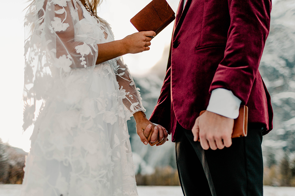  winter Yosemite wedding with the groom in a burgundy velvet tuxedo