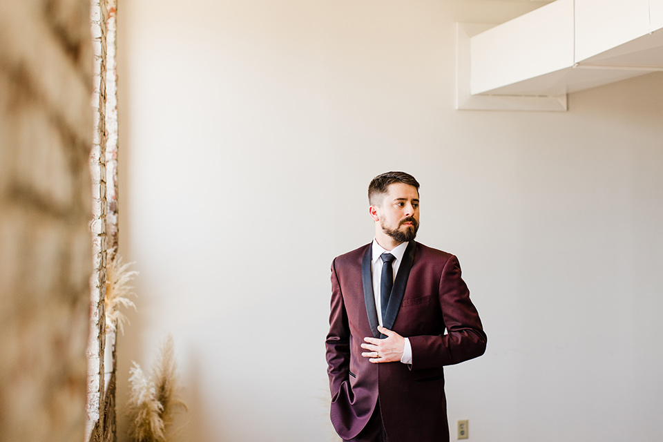  burgundy and green wedding with winter vibes - groom 