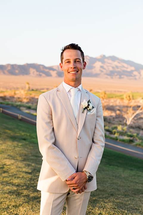  a tan and teal wedding with rustic chic details – groom 