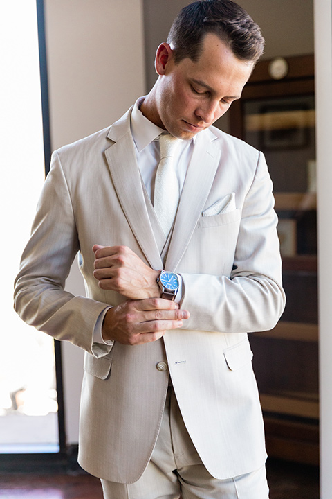  a tan and teal wedding with rustic chic details – groom 