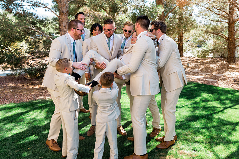  a tan and teal wedding with rustic chic details – groomsmen 