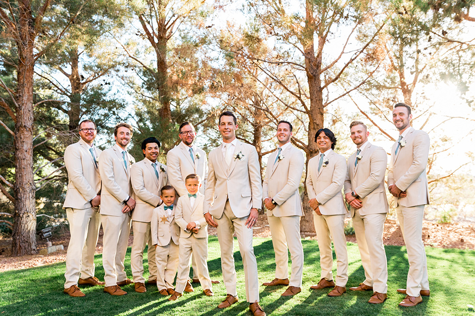  a tan and teal wedding with rustic chic details – groomsmen 