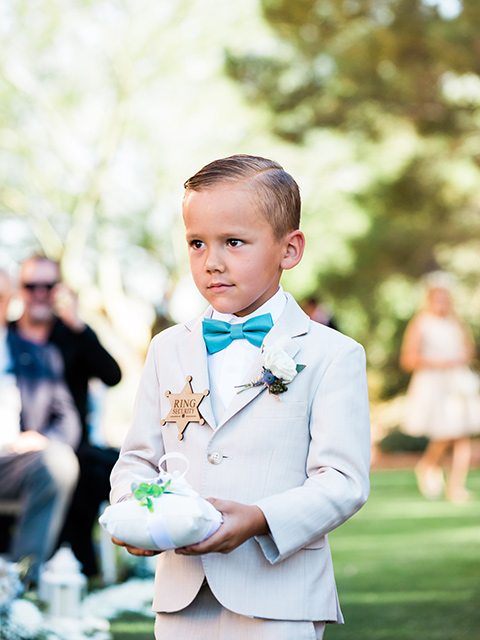  a tan and teal wedding with rustic chic details – ring bearer 