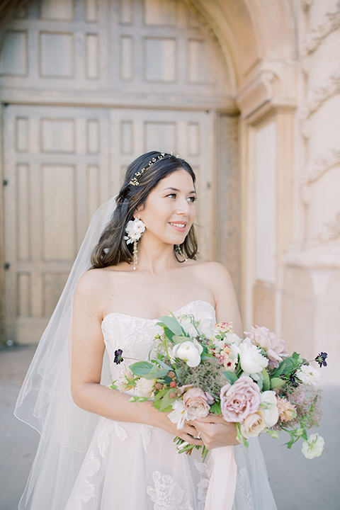  classic and modern balboa wedding with the groom in a navy shawl – bride