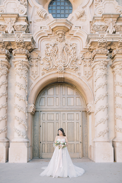  classic and modern balboa wedding with the groom in a navy shawl – bride 