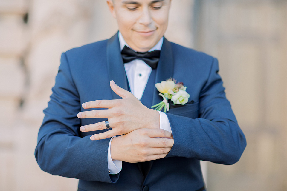  classic and modern balboa wedding with the groom in a navy shawl – groom