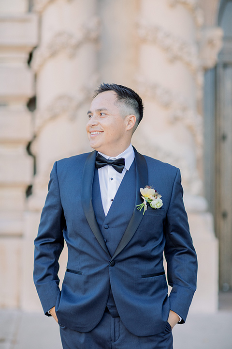  classic and modern balboa wedding with the groom in a navy shawl – groom