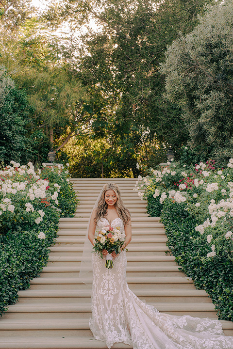  a romantic blush and blue wedding with garden details - bride 