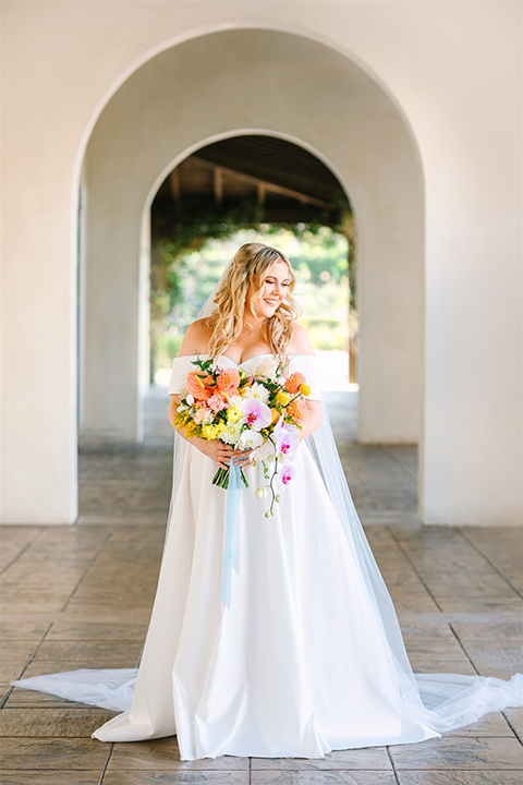  a beachy wedding with bold pastel colors and fun details - bride 