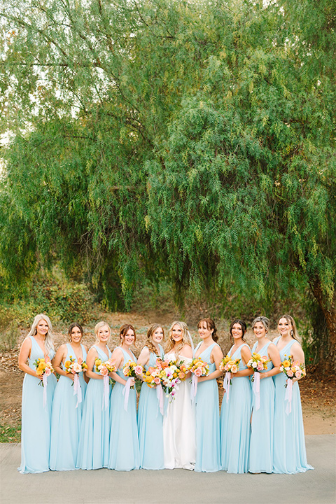  a beachy wedding with bold pastel colors and fun details - bridesmaids 