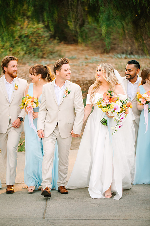  a beachy wedding with bold pastel colors and fun details - wedding party 