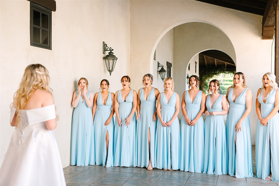  a beachy wedding with bold pastel colors and fun details - bride and bridesmaids 