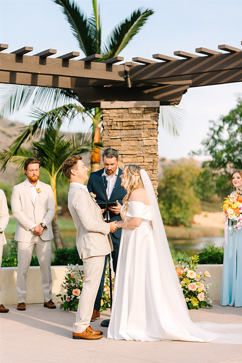  a beachy wedding with bold pastel colors and fun details - vows 