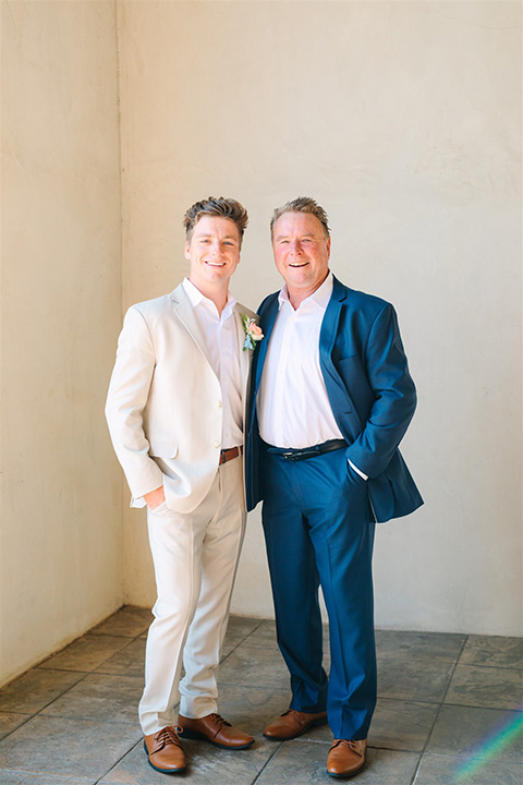  a beachy wedding with bold pastel colors and fun details - father and son 