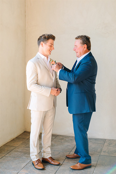  a beachy wedding with bold pastel colors and fun details - father and son 