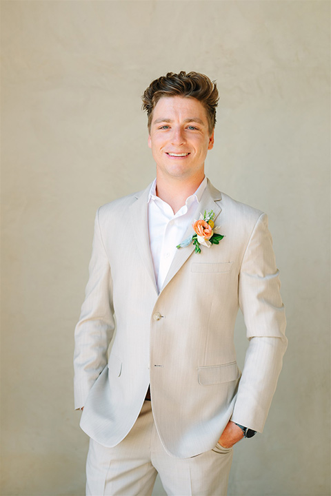  a beachy wedding with bold pastel colors and fun details - groom 