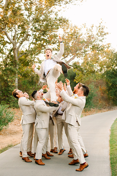  a beachy wedding with bold pastel colors and fun details - groomsmen 