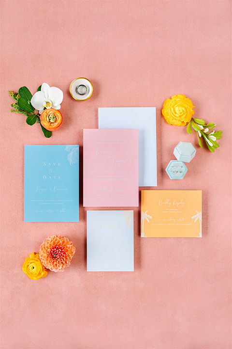  a beachy wedding with bold pastel colors and fun details - invitations 