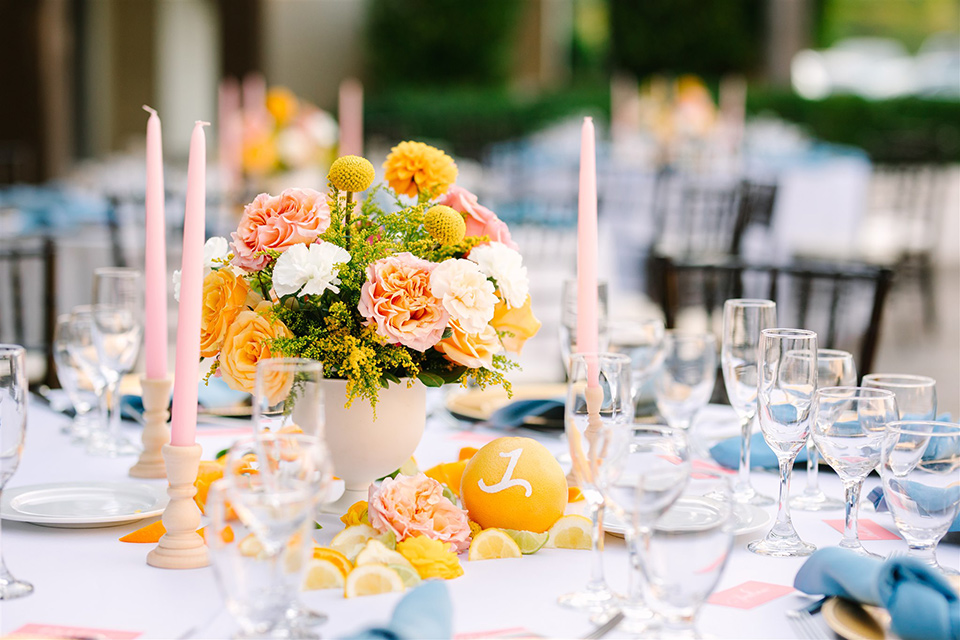  a beachy wedding with bold pastel colors and fun details - table décor 