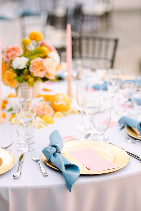  a beachy wedding with bold pastel colors and fun details - reception table décor 