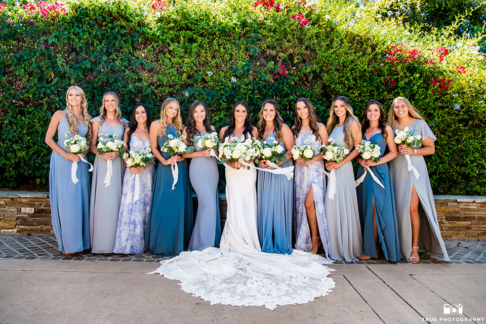 something blue inspired wedding with the bridesmaids in blue dresses the groomsmen in light blue suits and the bride in a lace gown – bridesmaids