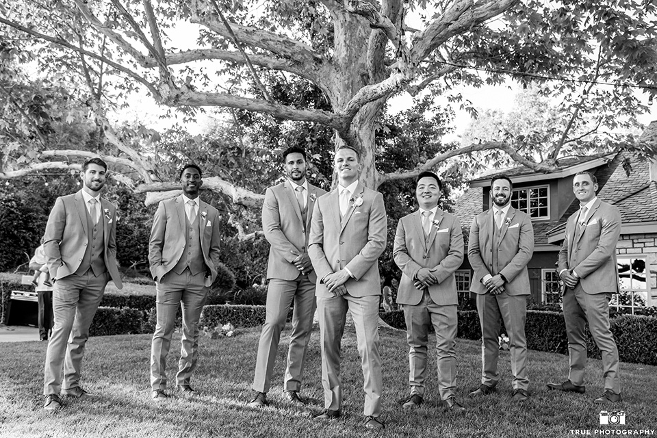  something blue inspired wedding with the bridesmaids in blue dresses the groomsmen in light blue suits and the bride in a lace gown – groomsmen