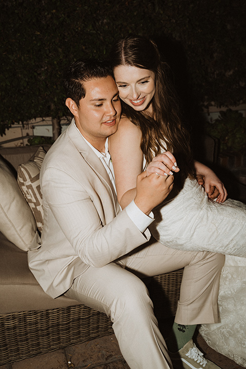  boho modern beach wedding on the sand – couple at reception