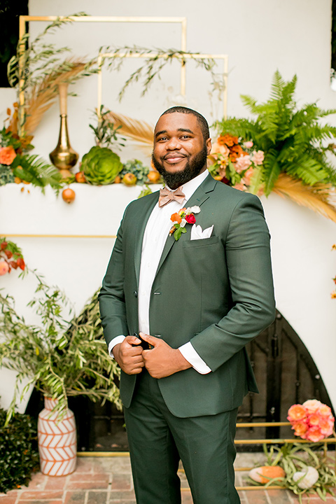  green and yellow casino san clemente wedding with the groom in a green suit - groom 