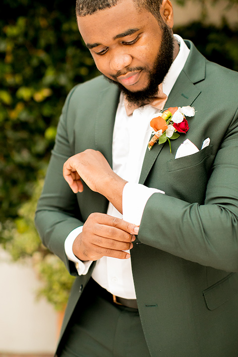  green and yellow casino san clemente wedding with the groom in a green suit - groom 