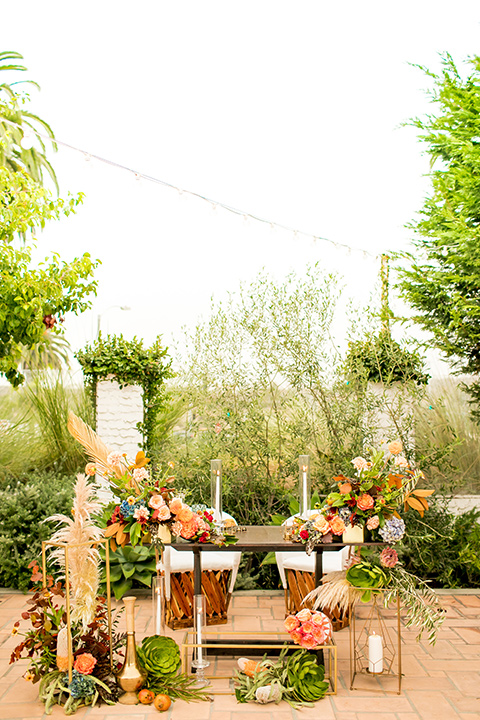  green and yellow casino san clemente wedding with the groom in a green suit – reception tables 