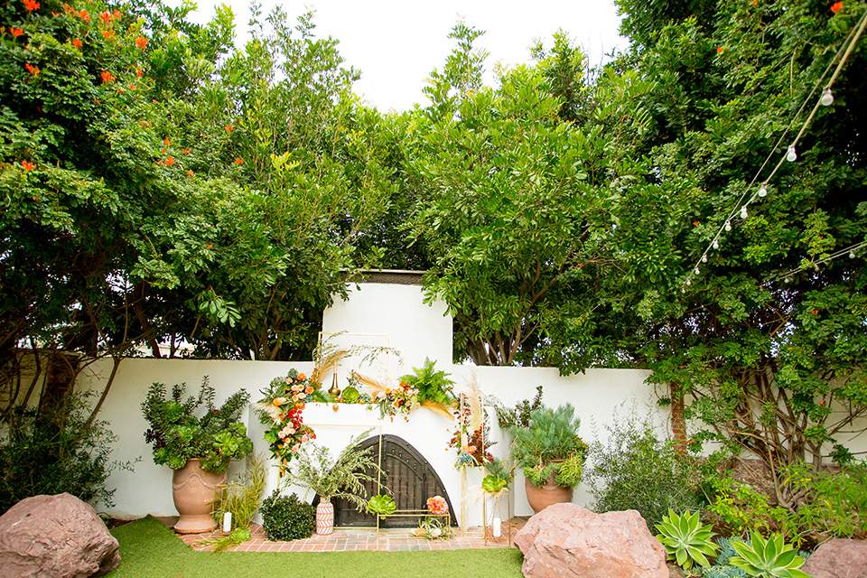  green and yellow casino san clemente wedding with the groom in a green suit – ceremony decor