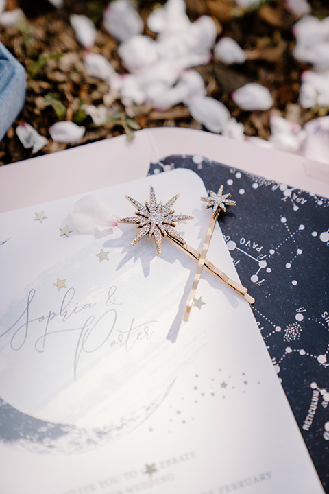  celestial cherry blossom wedding with the groom in a light blue coat and grey pants – bridal accessories