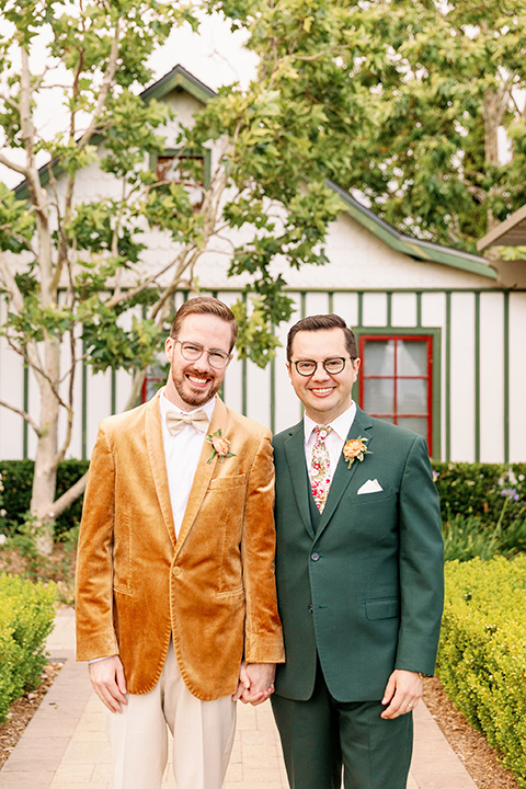  a dreamy garden wedding full of color and disco balls - couple walking 
