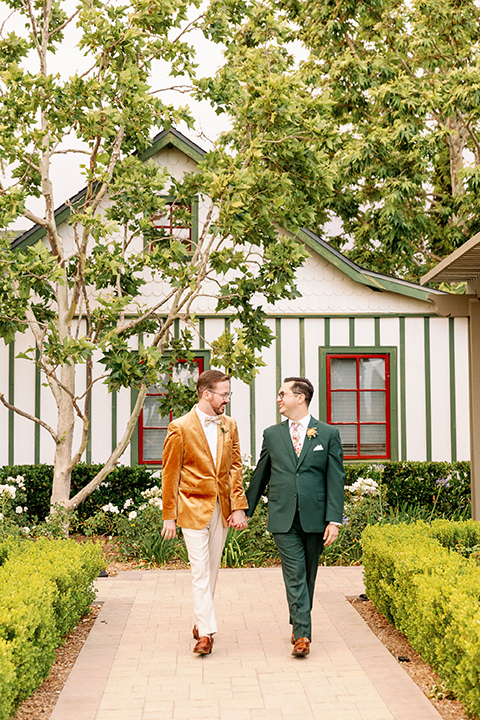  a dreamy garden wedding full of color and disco balls - couple walking 
