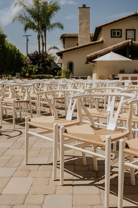  pink and black ranch wedding with elegant details - chairs and tables 