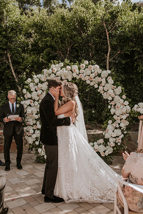  pink and black ranch wedding with elegant details - first kiss  