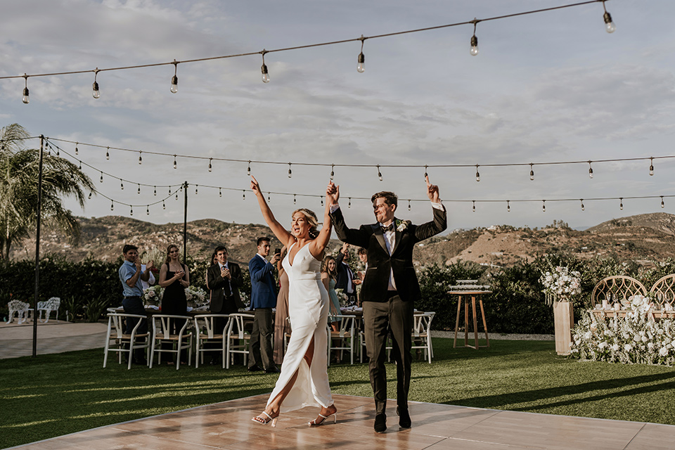  pink and black ranch wedding with elegant details - entering the reception space 