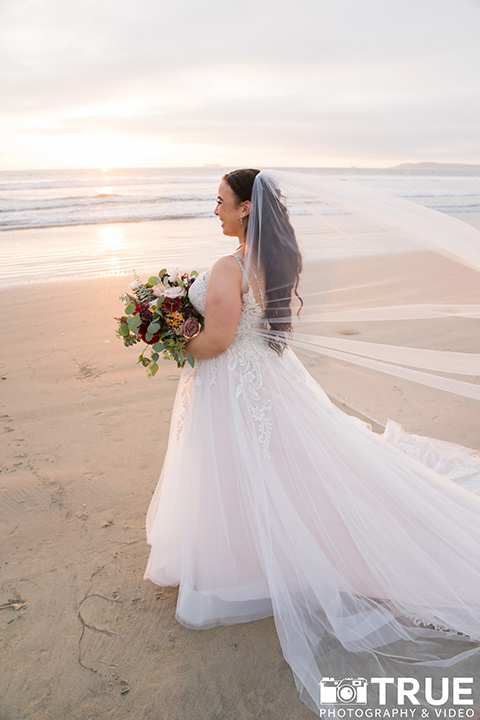  black and white beach wedding with lux details – bride