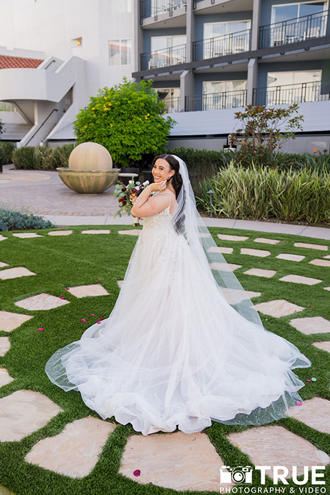  black and white beach wedding with lux details – bride